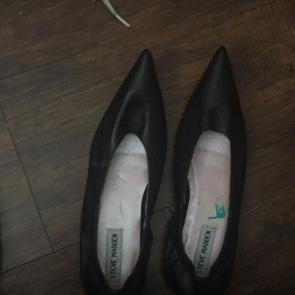 Steve Madden black pointed toe shoes.